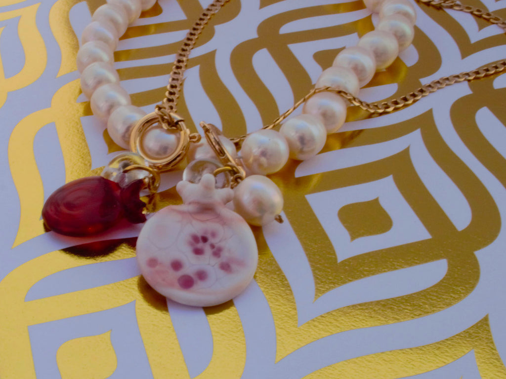 Pink pomegranate glass pendant, charm – a symbol of fertility and abundance