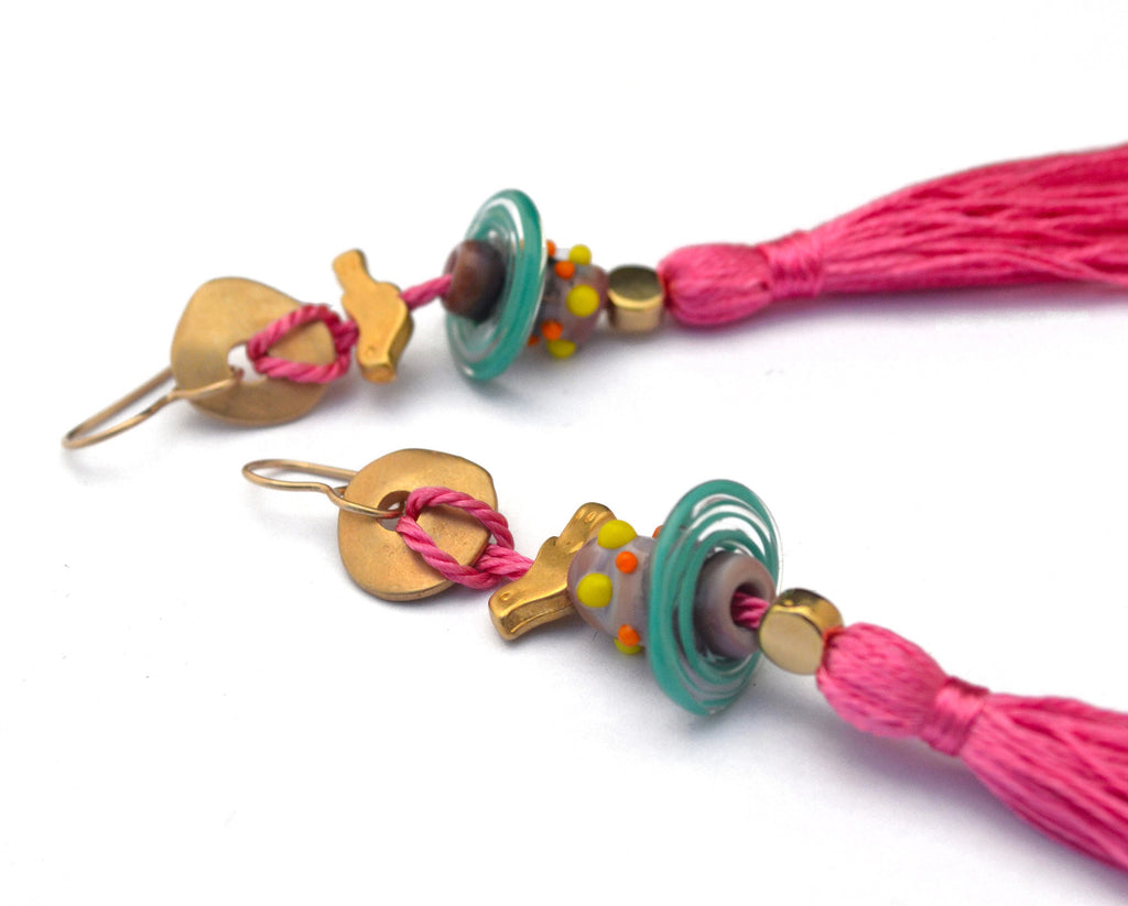 Carnavero earrings Moreno handmade glass beads with gold plated parts. Silk tassel. Gold filled ear pieces. Light blue.
