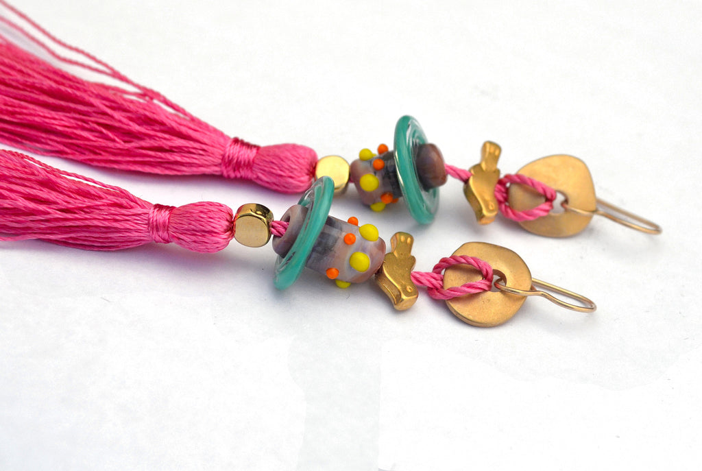Carnavero earrings Moreno handmade glass beads with gold plated parts. Silk tassel. Gold filled ear pieces. Light blue.