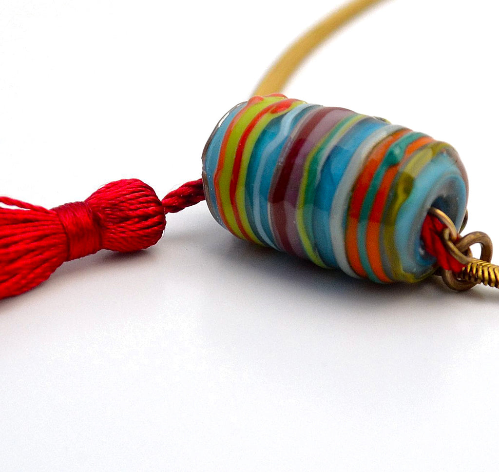 Carnavero Moreno handmade glass pendant. Silk tassel