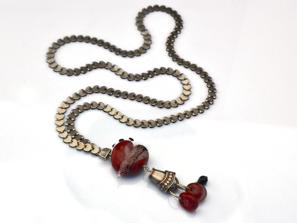 Turquoise polka dot heart charm necklace