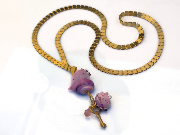 Pink heart charm necklace