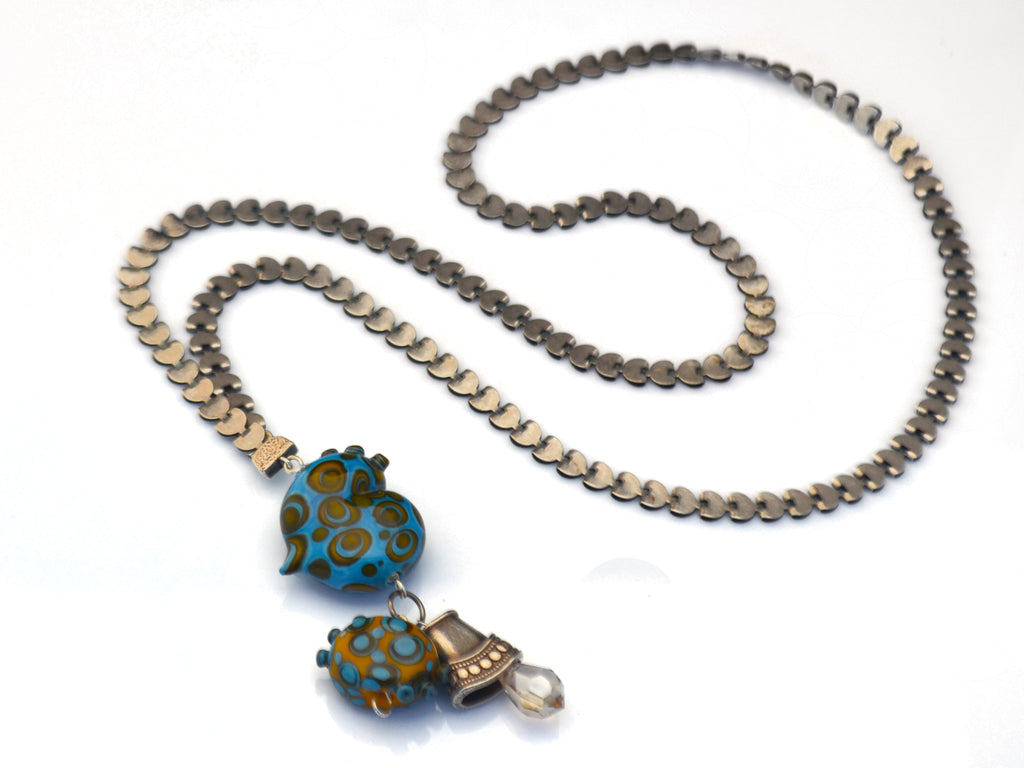 Turquoise polka dot heart charm necklace