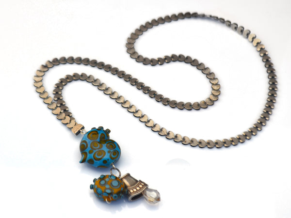 Turquoise polka dot heart charm necklace