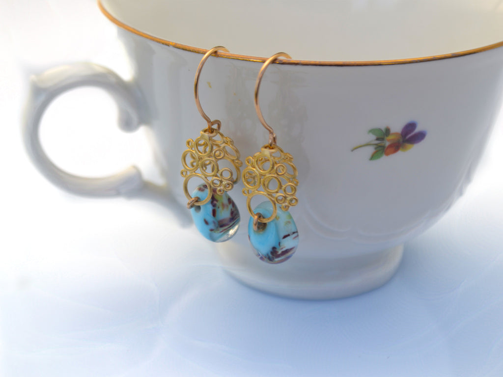 Vintage style turquoise designer earrings.
