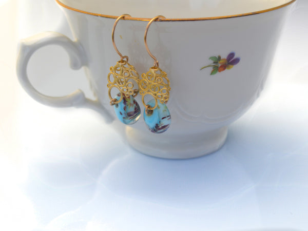 Vintage style turquoise designer earrings.