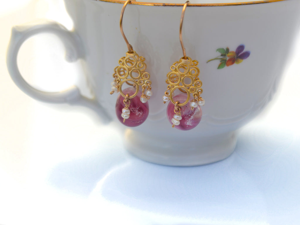 Vintage style pink designer earrings.