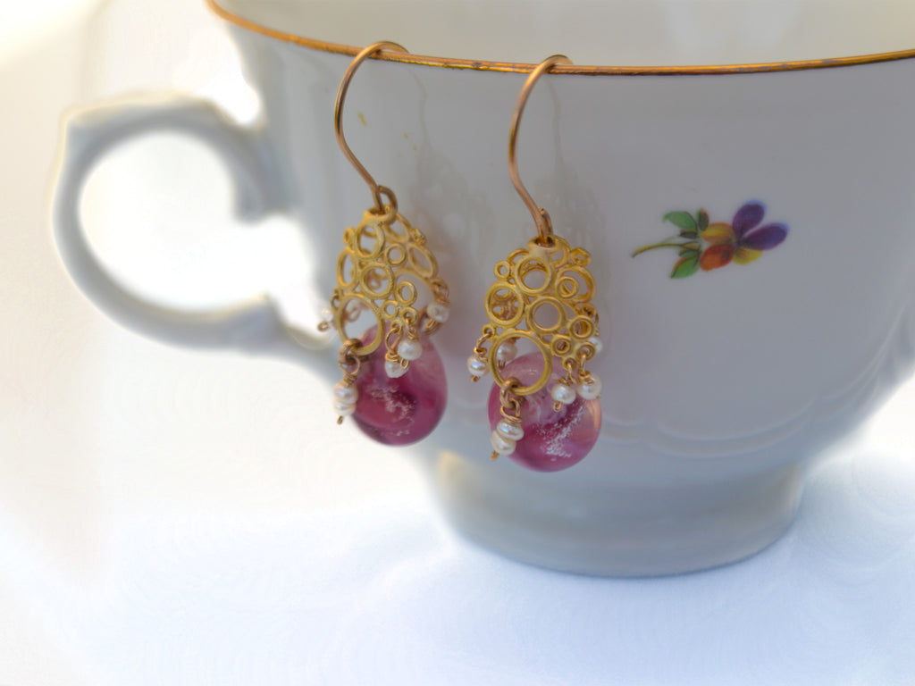 Vintage style pink designer earrings.