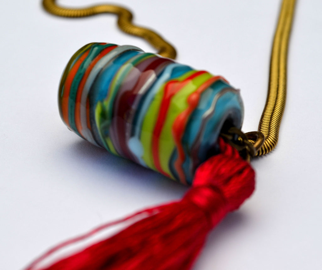 Carnavero Moreno handmade glass pendant. Silk tassel