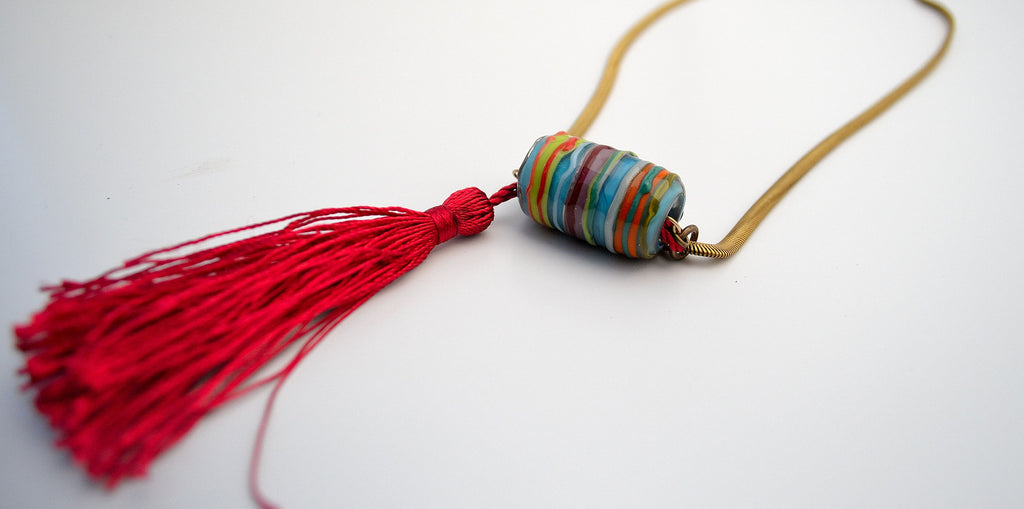 Carnavero Moreno handmade glass pendant. Silk tassel