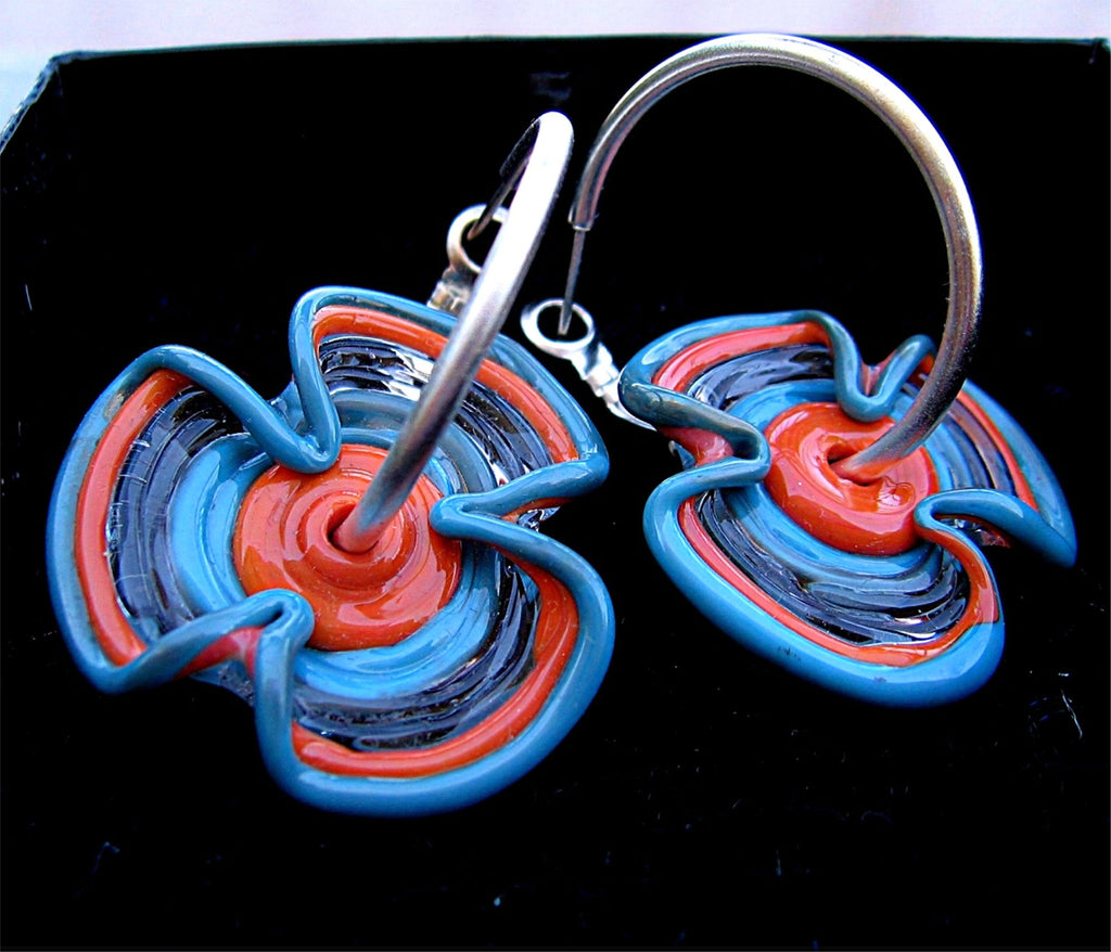 HOOPLA.  A pair of glass hoop earrings